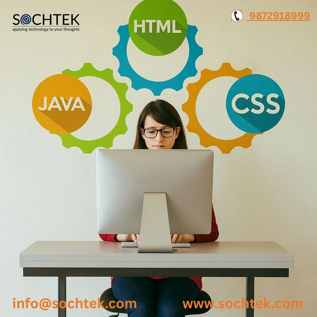 Web developer at desk with code icons